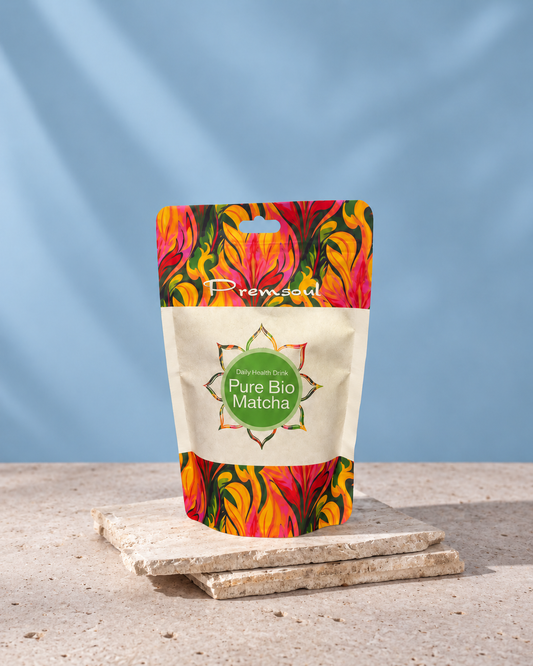 Premsoul Pure Bio Matcha pouch on two natural stone tiles against a pale blue background